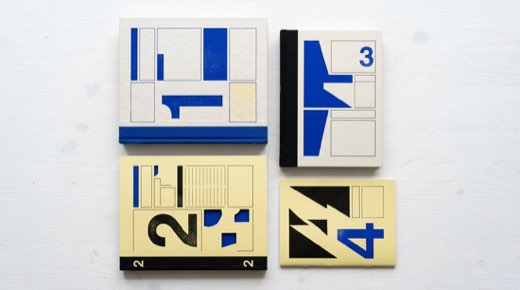 Colección de cuatro publicaciones con sistema gráfico azul y negro